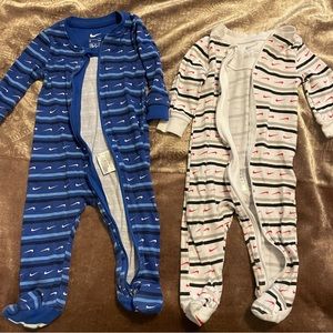 Two Nike Onesies